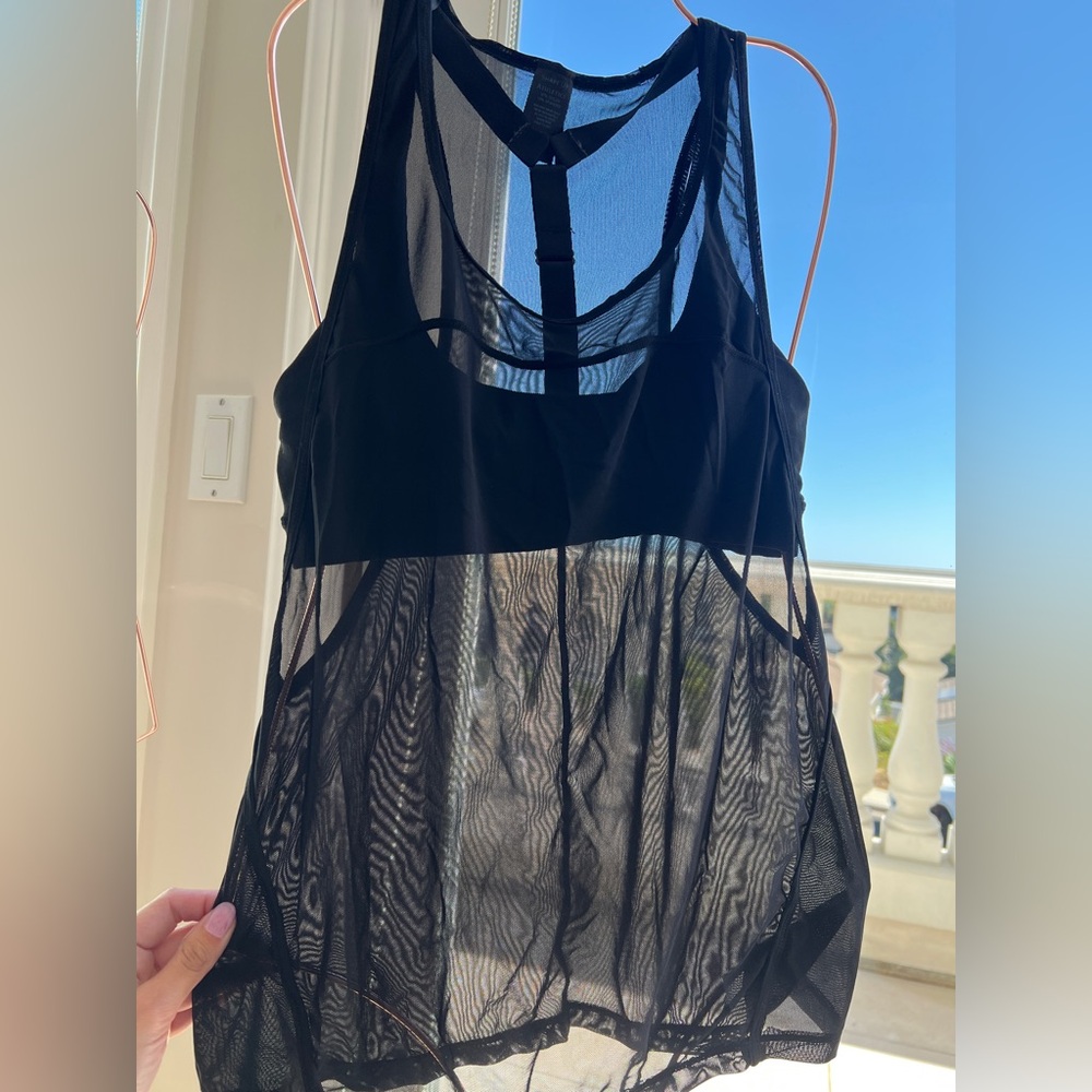 Black sports bra with mesh tank top